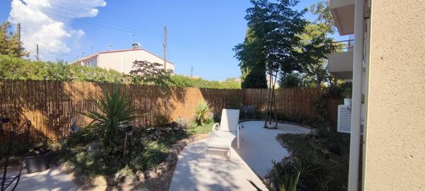 Appartement aux rez-de-chaussée entièrement rénové avec jardin