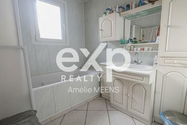 Maison de plain-pied avec sous-sol complet