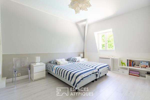 Élégante demeure familiale avec piscine et jardin paysager