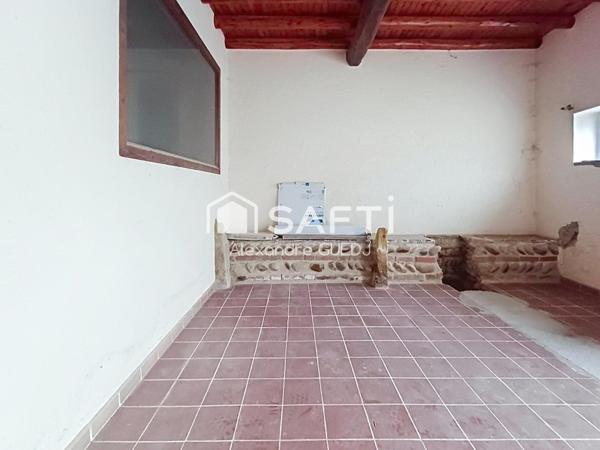 MAISON A RENOVER AVEC GRAND GARAGE ET TERRAIN DE 450 M²