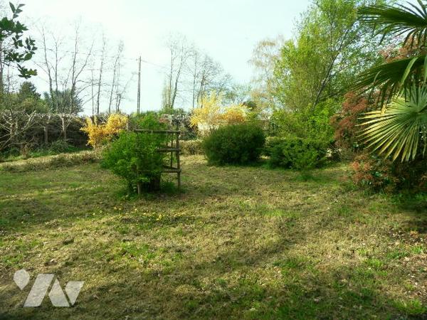 Maison de plain-pied avec 5 chambres à NEUVILLE SUR SARTHE
