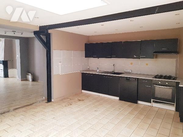Très beau potentiel pour cette maison de caractère de 122 m² habitable avec jardin.