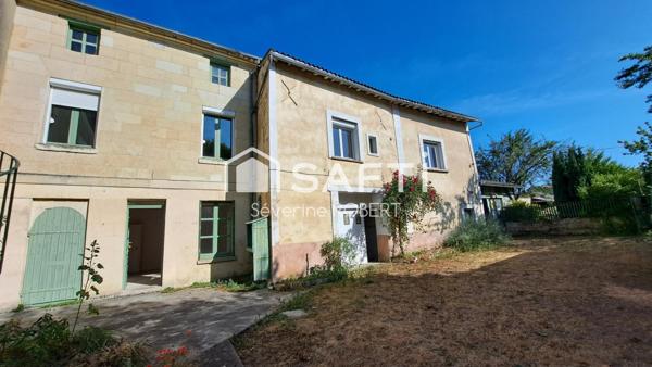 Ensemble immobilier avec beau potentiel