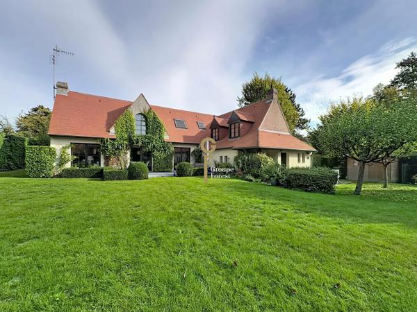 Maison de caractère au Cartelot avec jardin paysager