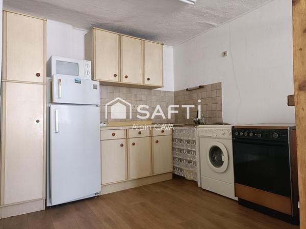 Appartement de 62m²sur 2 niveaux avec jardinet et caves