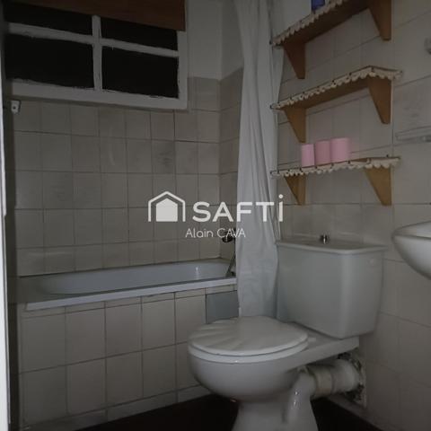 Appartement de 62m²sur 2 niveaux avec jardinet et caves