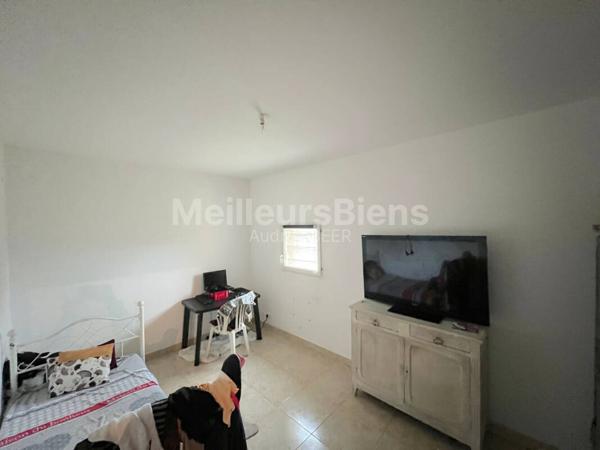 Ensemble immobilier: 1 appartement + 1 local commercial de 190 m² + 1 local de 55 m²