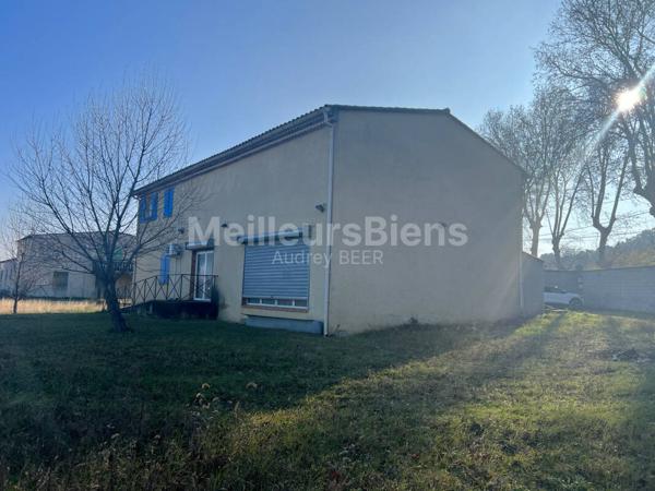 Ensemble immobilier: 1 appartement + 1 local commercial de 190 m² + 1 local de 55 m²