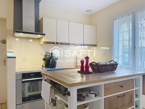 Maison de plain-pied au cœur du village – Calme, jardin et potentiel