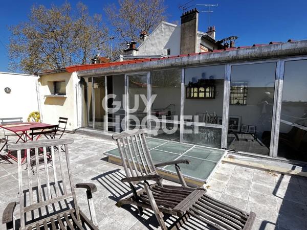 Maison de ville avec jardin et toit terrasse