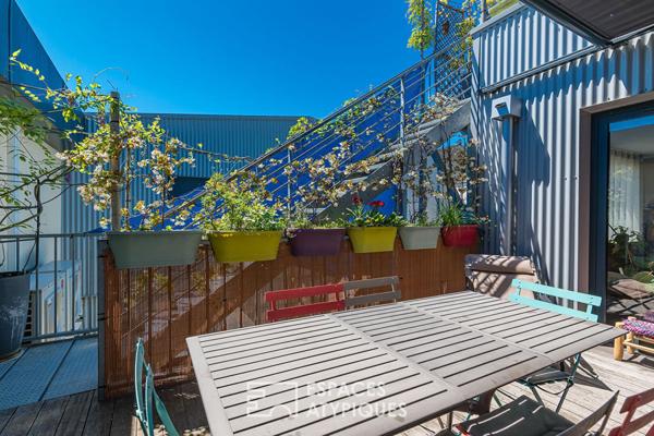Ancien entrepôt rénové avec piscine, garage et terrasses proche des Quais