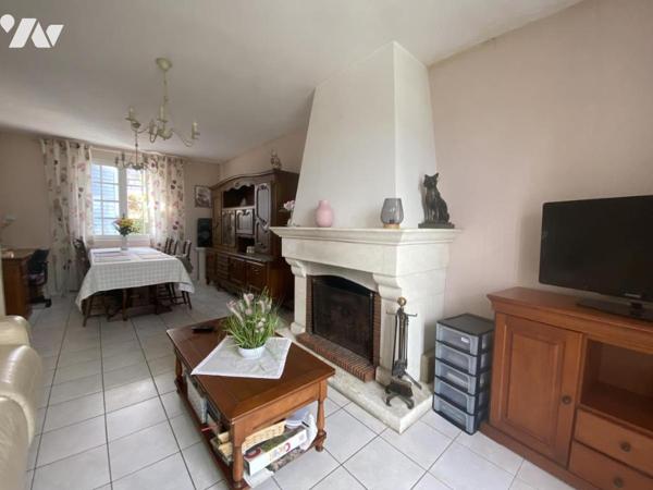 MAISON A DEUX PAS DES REMPARTS- T4 AVEC JARDIN