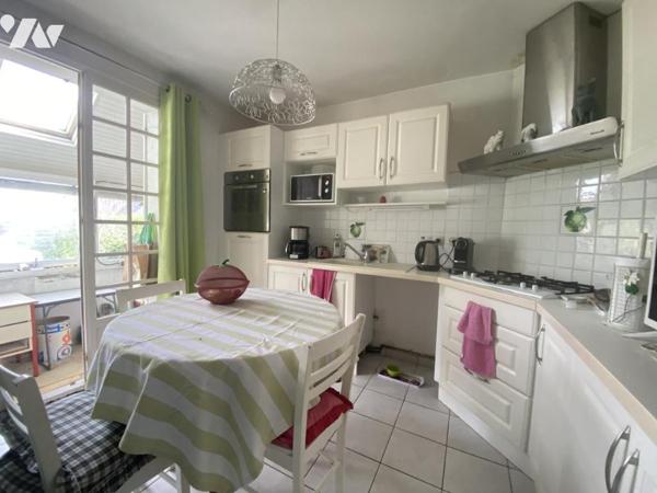 MAISON A DEUX PAS DES REMPARTS- T4 AVEC JARDIN