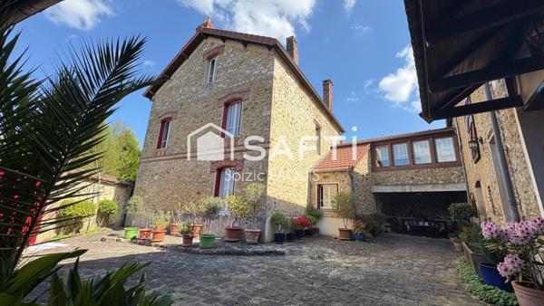 Maison de caractère en pierre meulière avec des grandes dépendances !!
