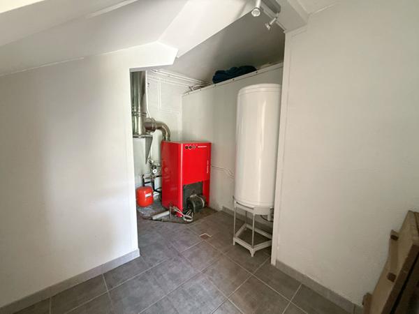 A VENDRE : MAISON RENOVEE AVEC JARDIN, GARAGE ET POTENTIEL LOCATIF A AX-LES-THERMES