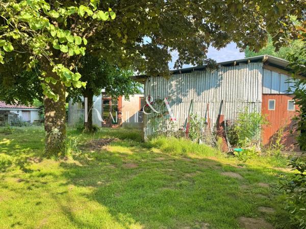 PAVILLON 4 CHAMBRES AVEC GARAGE ET DÉPENDANCES