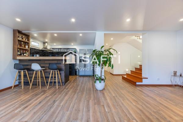 Maison familiale d’exception avec DPE A, espace indépendant et prestations haut de gamme.