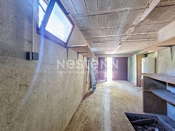 Sur plus de 2000 m2 de terrain au calme petite maison avec garage, sur Retournac