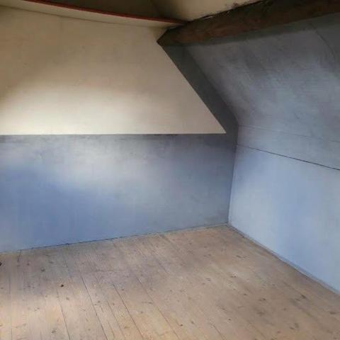 Maison de type maître dans un quartier calme.
