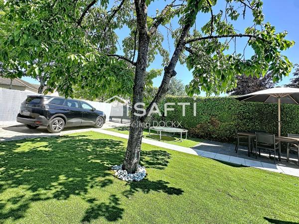 Spacieuse maison avec garage et agréable jardin