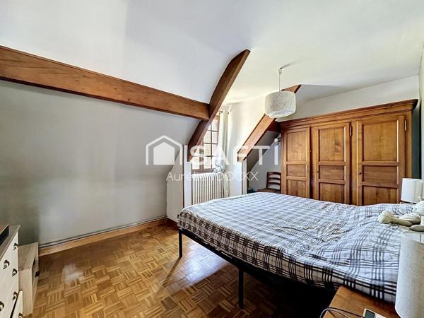 Spacieuse maison avec garage et agréable jardin