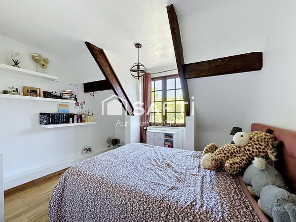 Spacieuse maison avec garage et agréable jardin