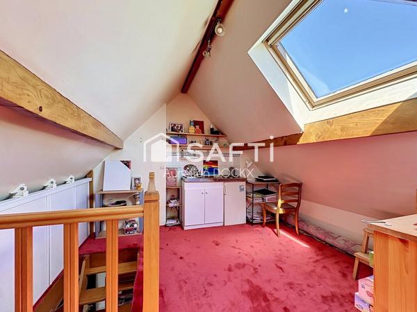 Spacieuse maison avec garage et agréable jardin