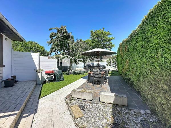 Spacieuse maison avec garage et agréable jardin