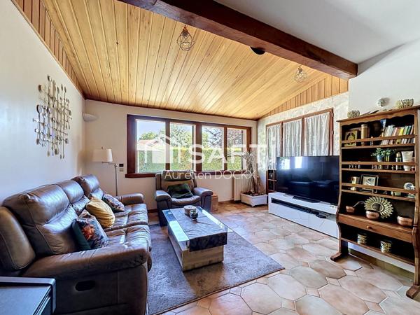 Spacieuse maison avec garage et agréable jardin