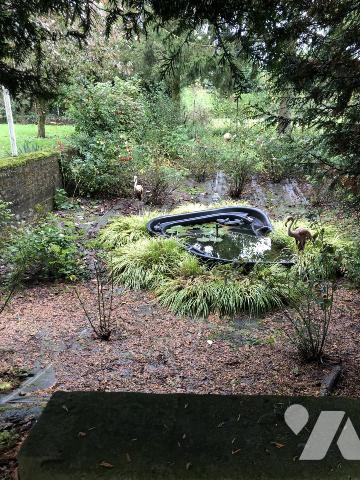 Un corps de ferme avec maison à usage d'habitation, une grange rénovée et 3 hectares de pâtures