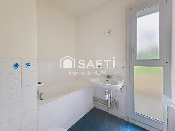 Appartement à rafraîchir ,toutes commodités à pied