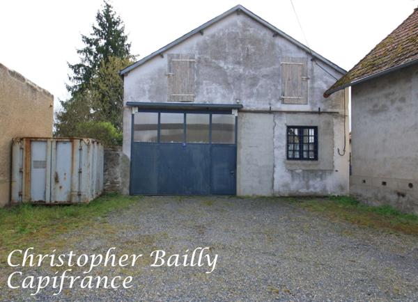 Entrepôt de 260 m² sur un terrain à bâtir de 1000 m².