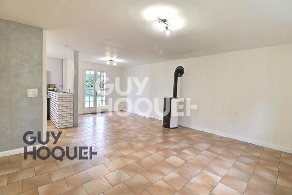 Maison de plain-pied avec grand terrain