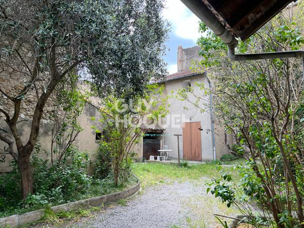 bâtiment ancien de 400 m² plein coeur de ville à restaurer