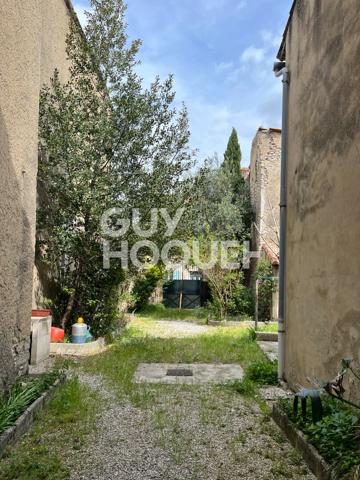 bâtiment ancien de 400 m² plein coeur de ville à restaurer