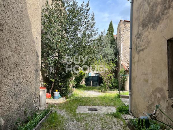 bâtiment ancien de 400 m² plein coeur de ville à restaurer