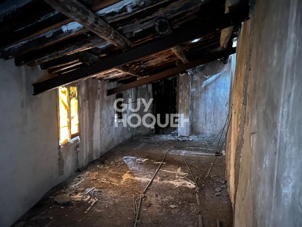 bâtiment ancien de 400 m² plein coeur de ville à restaurer