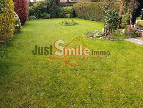 Maison en retrait de rue