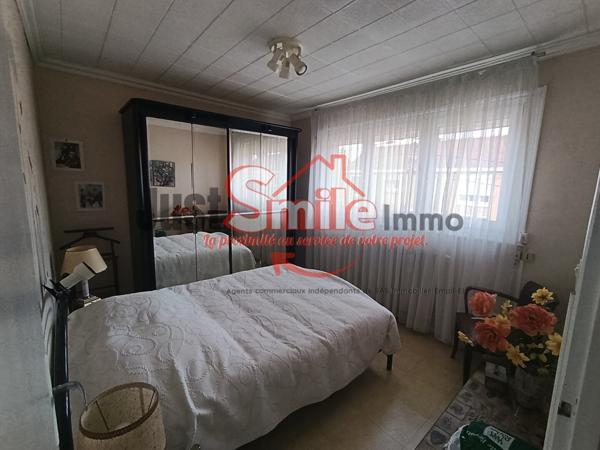 Maison en retrait de rue