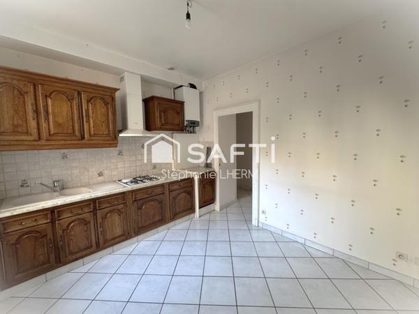Appartement de caractère de type 3 aux multiples prestations