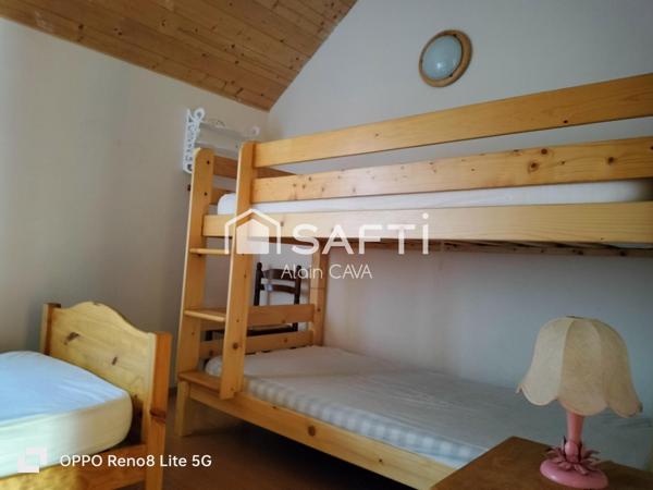 Appartement de 60m² avec garage sur 330m² de terrain et 58m² de jardinet