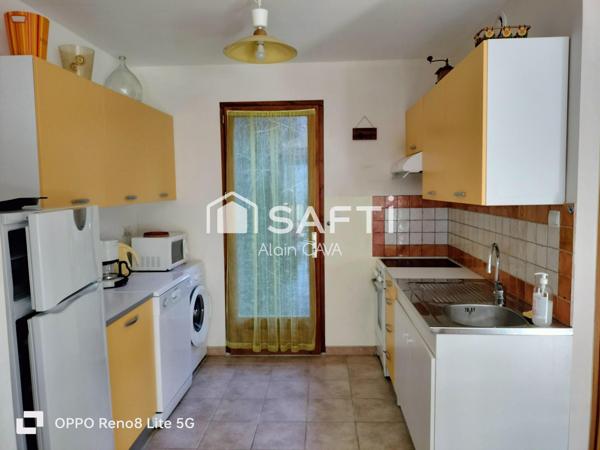 Appartement de 60m² avec garage sur 330m² de terrain et 58m² de jardinet