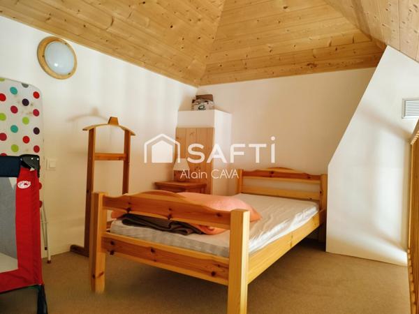 Appartement de 60m² avec garage sur 330m² de terrain et 58m² de jardinet