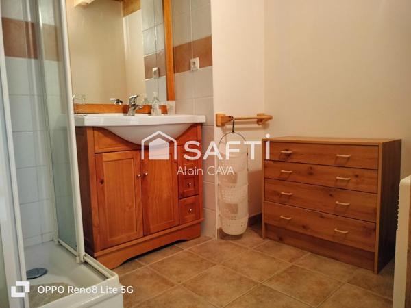 Appartement de 60m² avec garage sur 330m² de terrain et 58m² de jardinet