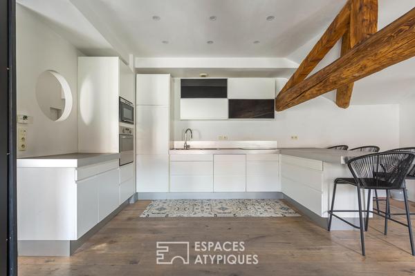 Duplex rénové en dernier étage