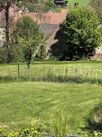 Maison familiale d'environ 181m2 avec sous sol plus annexes sur un terrain de 6216m2 à DURSTEL.