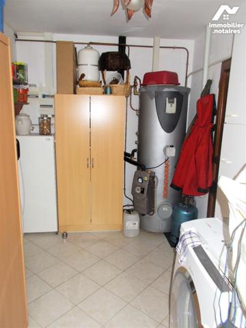 A proximité du centre-ville et des commerces, jolie maison de plain-pied à vendre en viager occupé