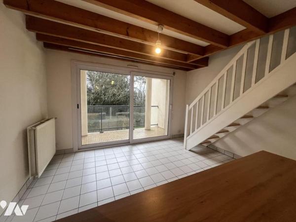Appartement style duplex au 1er étage