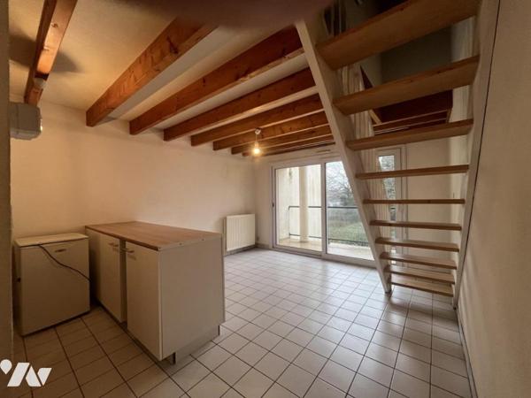 Appartement style duplex au 1er étage