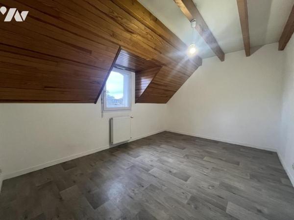 Appartement style duplex au 1er étage